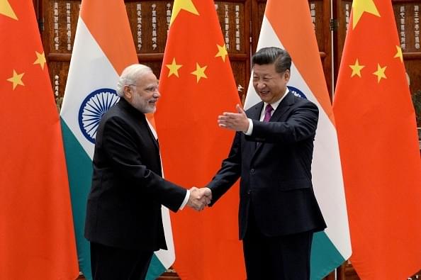 Prime Minister Narendra Modi (L) with Chinese President Xi Jinping in Hangzhou, China. (Wang Zhou - Pool/Getty Images)
